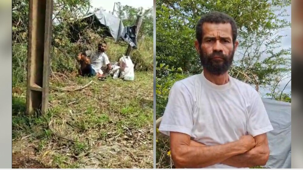 Homem em situação de rua vive embaixo de lona na BR-364